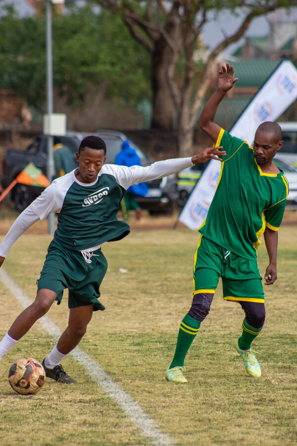 A player rises for a header