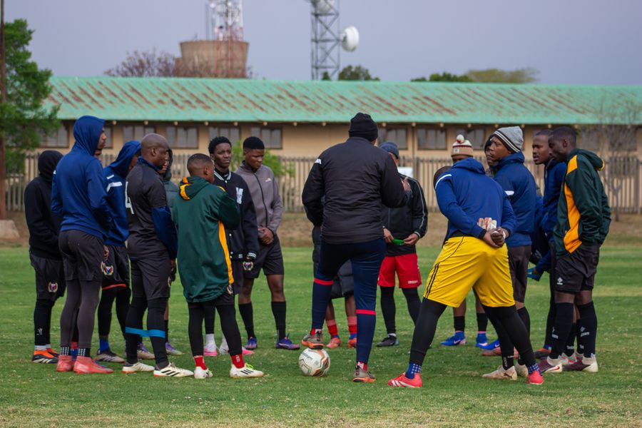 Players gather in a huddle