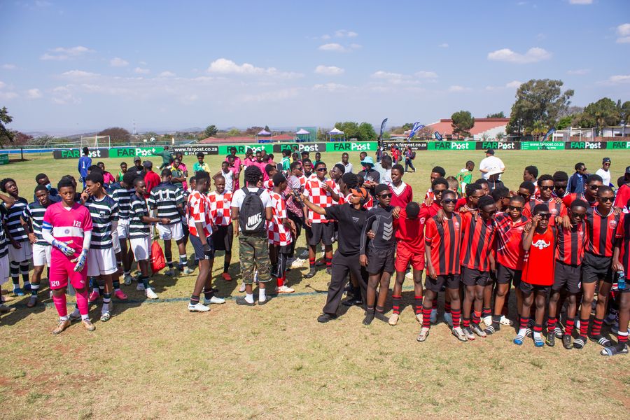 Teams gathered on the field